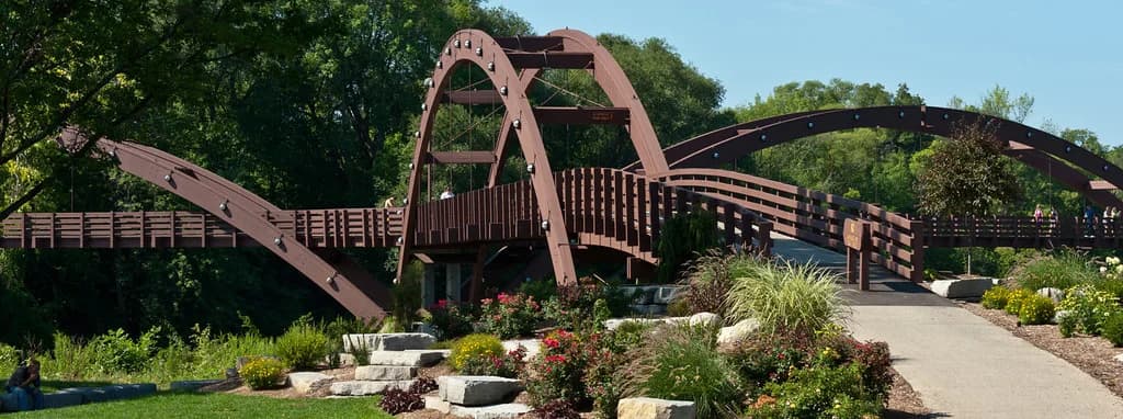 A landscaped garden and footbridge, from the Broyles website